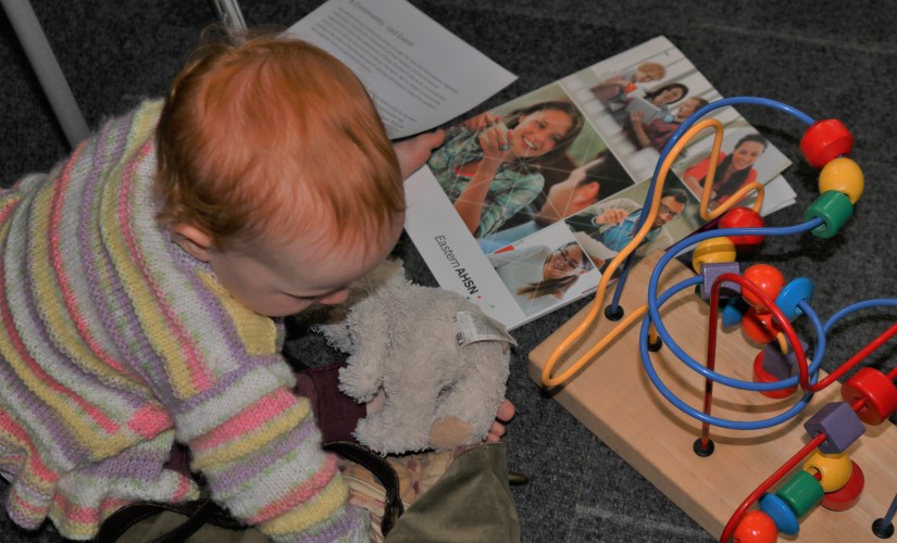 Child at event for patient participatory appraisal healthy new town programme Northstowe WEB