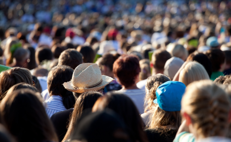 a large number of people in a crowd together