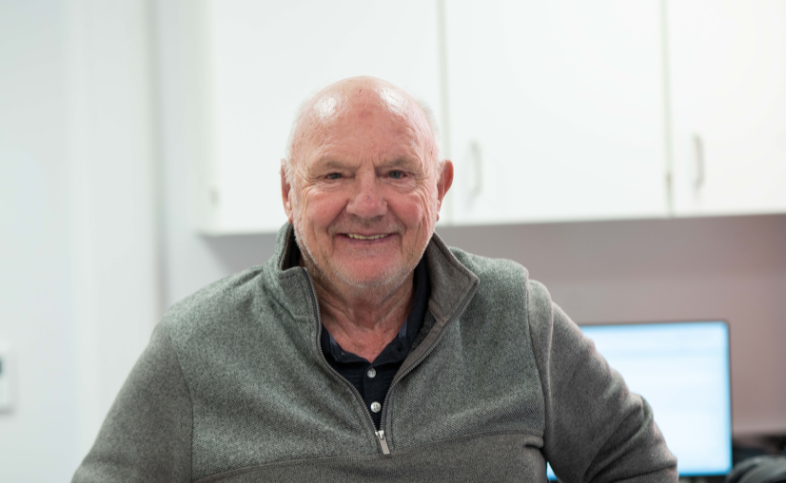 GaitSmart patient smiles at camera