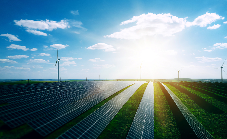 Field of solar panels and windturbines