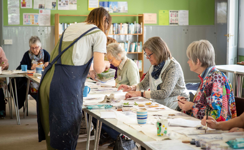 Group of elderly ladies doing craft activities